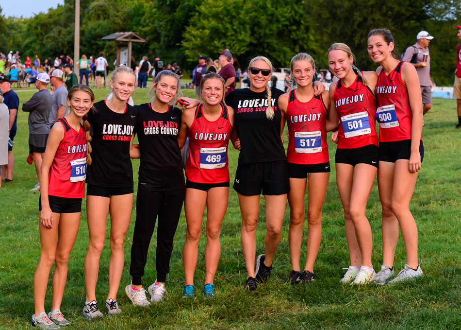 Lovejoy Girls Varsity Elite squad with Coach Littlefield and Bella Landrum