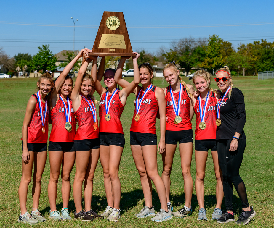 Lovejoy girls holding their championship trophy high