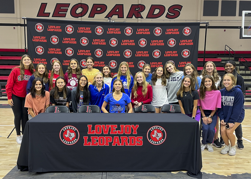 Amy Morefield and her teammates at her signing for Tulsa