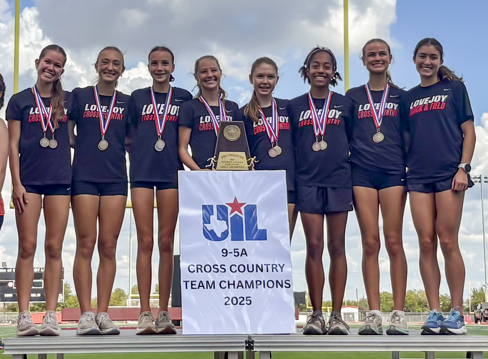 Varsity Girls on the podium at District Varsity Girls on the podium at District